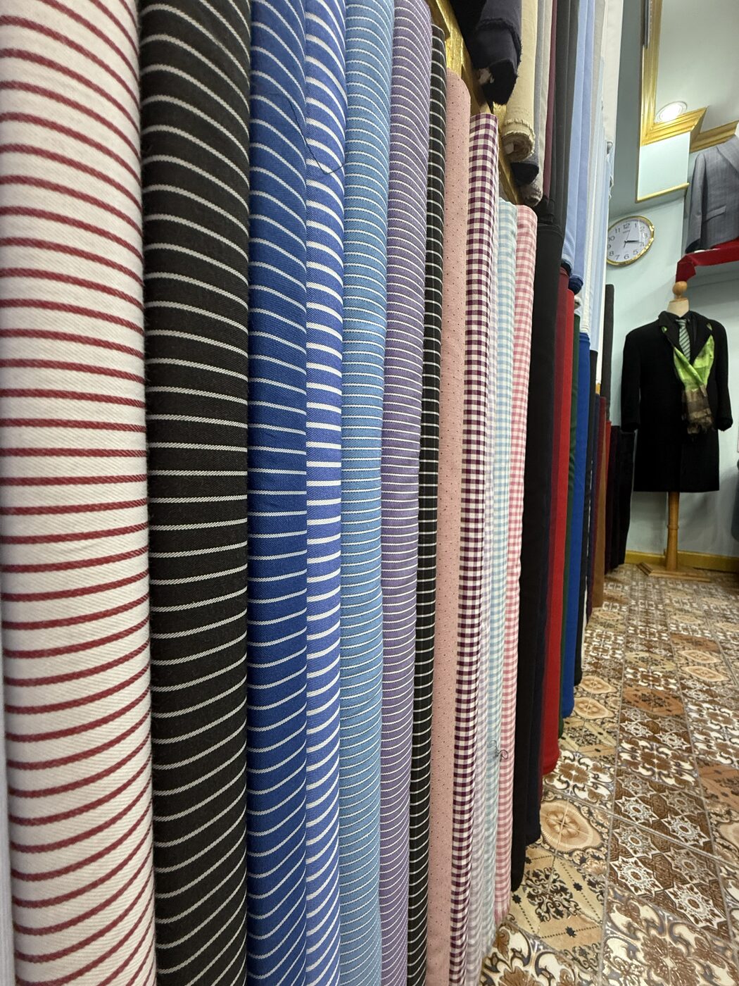 Bolts of striped and gingham shirting cloth